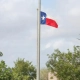Why Choose a Local Tax Preparer in Oak Cliff Over Generic Online Services? 2 Texas flag flying over Oak Cliff